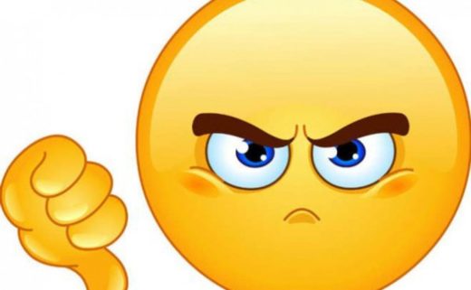 Emoji jaune mécontent qui fait du pouce vers le bas.